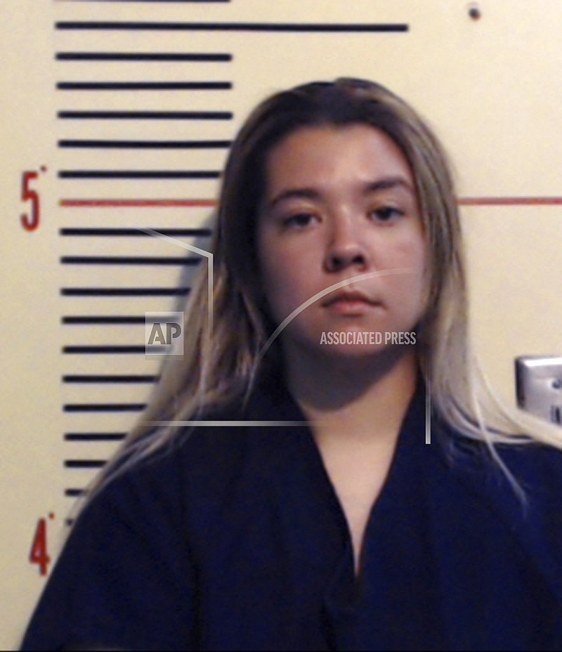 This undated booking photo provided by Parker County, Texas, sheriff's office shows Cynthia Marie Randolph. Randolph told investigators that she left her 2-year-old daughter and 16-month-old son in a hot car where they died May 26 , 2017, to teach the girl a lesson, and that they didn't lock themselves in, as she initially said, according to sheriff's officials. Randolph was being held Saturday, June 24, 2017 on two counts of causing serious bodily injury to a child. (Parker County, Texas, sheriff's office via AP)