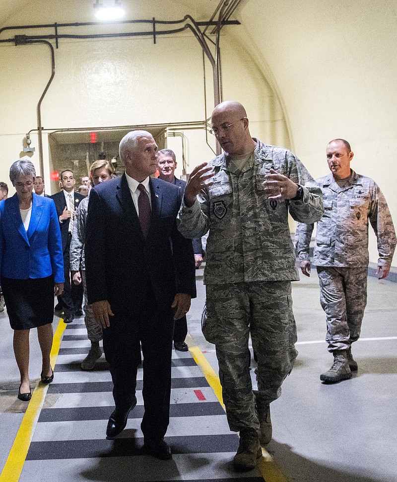 
              Vice President Mike Pence, center, tours the Cheyenne Mountain Air Force Station Friday, June 23, 2017, during his visit to Colorado Springs, Colo. (Christian Murdock/The Gazette via AP, Pool)
            