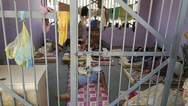 
              Prisoners lie in a newly renovated cell in Aden Central Prison, known as Mansoura, in this May 9, 2017 photo in Aden, Yemen. Another, closed section of the prison is part of a network of secret detention facilities run by the United Arab Emirates and its Yemeni allies, into which hundreds arrested on suspicion of al-Qaida links have disappeared. Some have been flown to an Emirati base in the nearby Horn of Africa, and some have been interrogated by American officials, witnesses said. (AP Photo/Maad El Zikry)
            