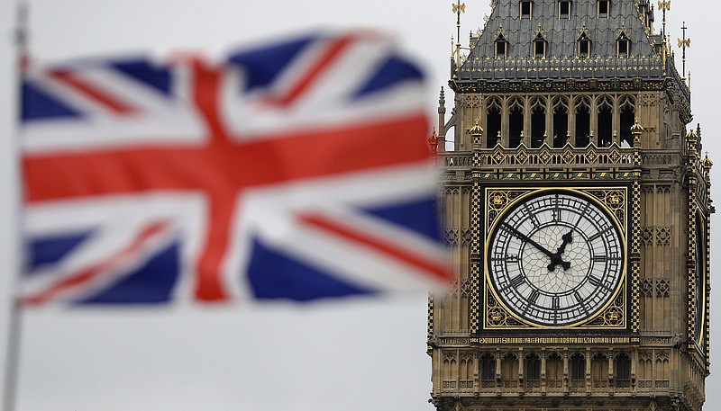 
              FILE - In this file photo dated Wednesday, March 29, 2017, a British flag blown by the wind near to Big Ben's clock tower in front of the Houses of Parliament in central London, Wednesday, March 29, 2017.   According to a statement released from the House of Commons Saturday June 24, 2017, British officials are investigating an alleged cyberattack Saturday on the country's Parliament after discovering "unauthorized attempts to access parliamentary user accounts." (AP Photo/Matt Dunham, FILE)
            