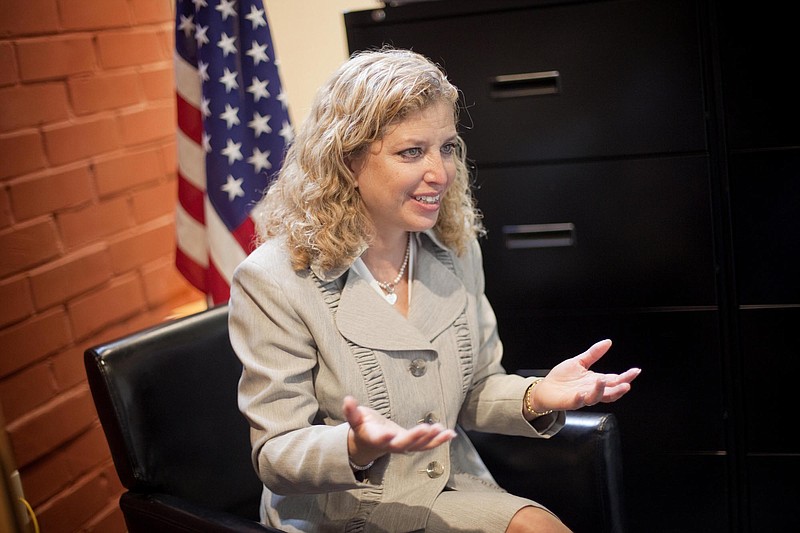 Democratic National Committee chairwoman and Florida Congresswoman Debbie Wasserman Schultz speaks to the media following the grand opening of the Georgia Democratic Party's new headquarters Wednesday, Oct. 19, 2011 in Atlanta. The Congresswoman says her party isn't conceding any corner of the country in the 2012 presidential election. She says there is a growing groundswell of Democratic momentum in the state and region, bolstered by the area's changing demographics. (AP Photo/David Goldman)