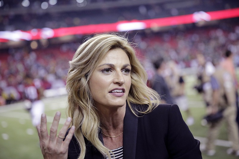 
              FILE - In this Oct. 30, 2016 file photo, Fox Sports broadcaster Erin Andrews, left, speaks with Atlanta Falcons wide receiver Julio Jones after an NFL football game against the Green Bay Packers in Atlanta. Jennifer Allen, a publicist for Andrews, confirms Sunday, June 25, 2017, that the 38-year-old Fox Sports sideline reporter and “Dancing with the Stars” co-host married the 35-year-old Stoll over the weekend.  (AP Photo/David Goldman, File)
            