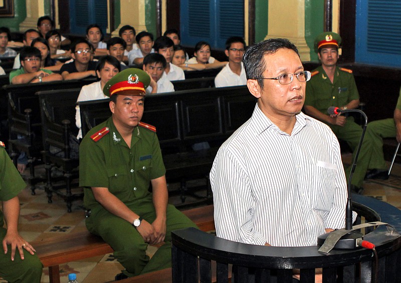 
              FILE - In this file photo dated Wednesday, Aug. 10, 2011, French-Vietnamese math professor Pham Minh Hoang appears in court in Ho Chi Minh City, Vietnam.  61-year old Pham Minh Hoang was arrested at his home in southern Ho Chi Minh City and forcibly exiled to France, he said during an interview Sunday June 25, 2017. (Hoang Hai/Vietnam News Agency FILE via AP)
            