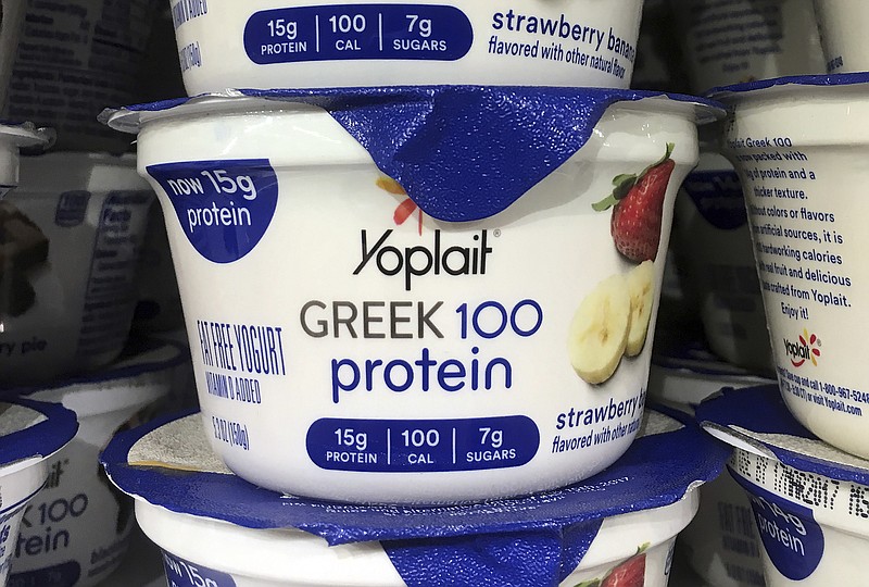 
              FILE - This Thursday, Feb. 23, 2017, file photo shows Yoplait Greek yogurt on display at a supermarket in Port Chester, N.Y. There’s Greek yogurt, Icelandic yogurt and Australian yogurt. Now, the U.S. maker of Yoplait says it want to bring even more culture to the dairy case. General Mills is hoping a new line of French-style yogurt can help boost its sales. Its Oui line will add to the growing variety in the yogurt case. (AP Photo/Donald King, File)
            