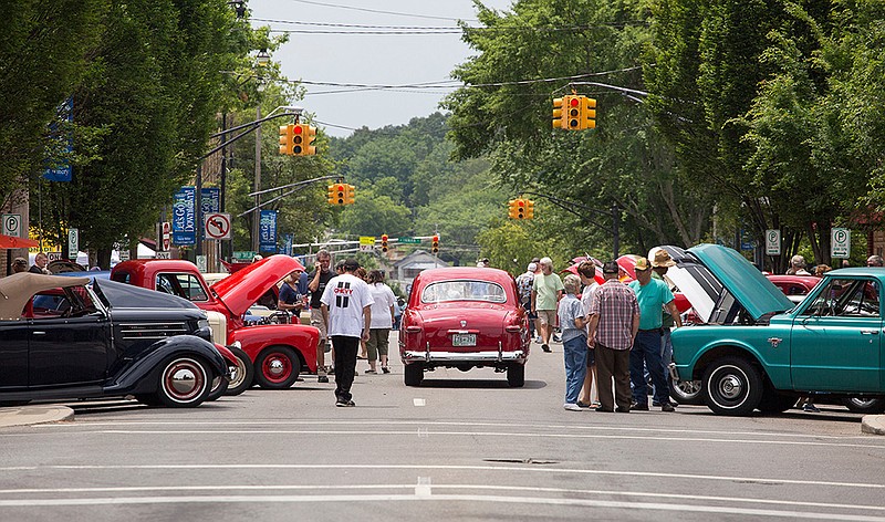 Patrons walk through downtown Cleveland, Tenn., during the MainStreet Cruise-in car show held over Memorial Day weekend. Photo by Dan Henry | DanHenryPhotography.com