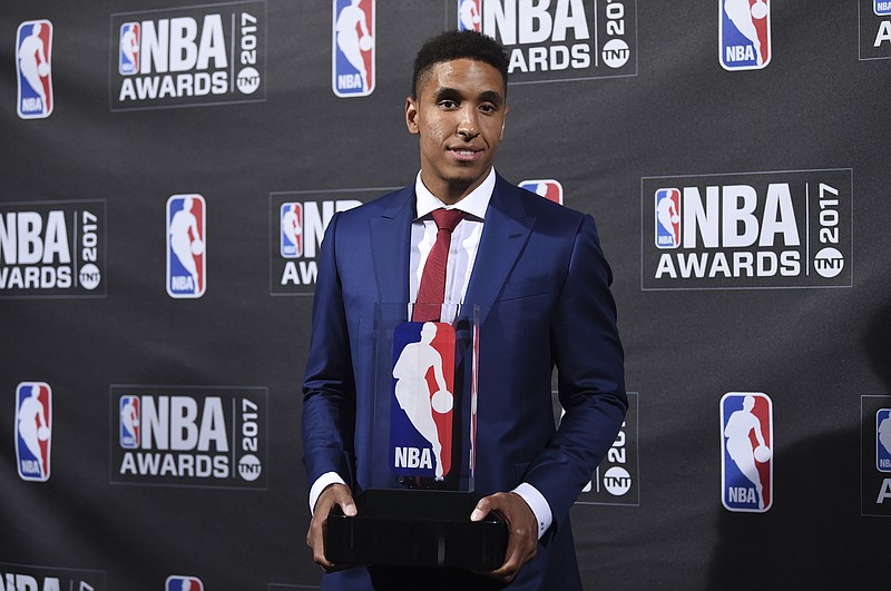 
              Kia NBA Rookie of the Year winner Malcom Brogdon poses in the press room at the 2017 NBA Awards at Basketball City at Pier 36 on Monday, June 26, 2017, in New York. (Photo by Evan Agostini/Invision/AP)
            