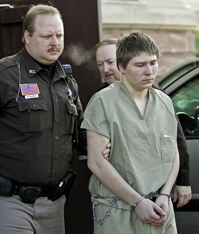 
              FILE - In this March 3, 2006, file photo, Brendan Dassey, is escorted out of a Manitowoc County Circuit courtroom in Manitowoc, Wis. Wisconsin attorneys asked a federal appeals court Monday, June 26, 2017, to keep Dassey, an inmate featured in the Netxflix series "Making a Murderer," behind bars while they fight a second ruling overturning his conviction. (AP Photo/Morry Gash, File)
            
