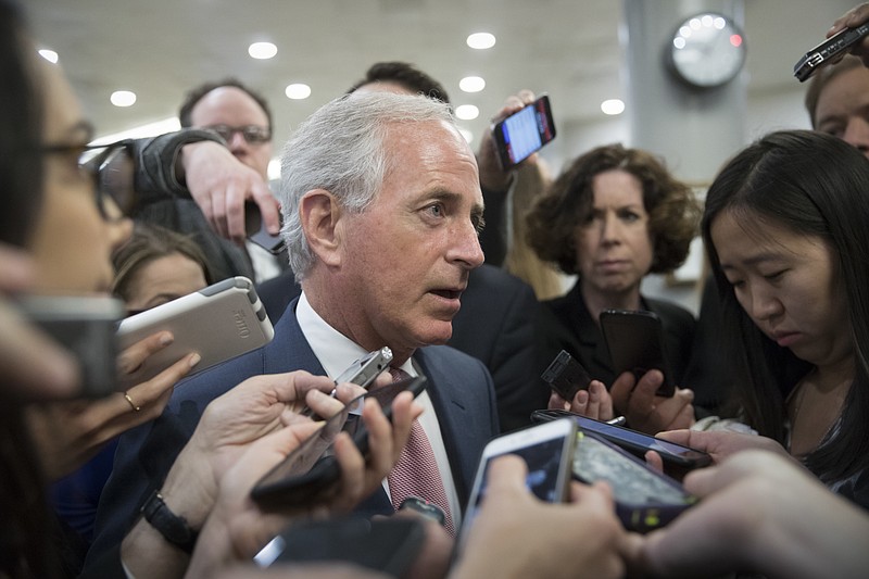
              FILE - In this May 10, 2017 file photo, Senate Foreign Relations Committee Sen. Bob Corker, R-Tenn. speaks to reporters on Capitol Hill in Washington. Corker said Monday, June 26, 2017, that he’ll withhold approval of U.S. weapons sales to several Middle Eastern allies until there is a clear path for settling a diplomatic crisis with Qatar.  (AP Photo/J. Scott Applewhite, File)
            