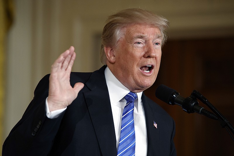 
              FILE - In this June 23, 2017 file photo, President Donald Trump speaks in the East Room of the White House in Washington. President Donald Trump unleashed a series of tweets Monday, June 26, 2017, in which he tried to place the blame for Russian meddling in U.S. politics on and deflect charges of obstruction and collusion onto former President Barack Obama. (AP Photo/Evan Vucci, File)
            