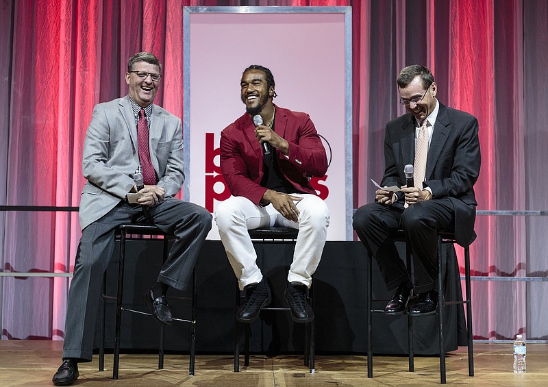 Sports editor Stephen Hargis, left, and sports writer David Paschall, right, interview Atlanta Falcons linebacker Vic Beasley on stage at the Times Free Press's Best of Preps banquet at the Chattanooga Convention Center on Tuesday, June 27, 2017, in Chattanooga, Tenn. Beasley was the guest speaker at the banquet which honors the area's best prep athletes.