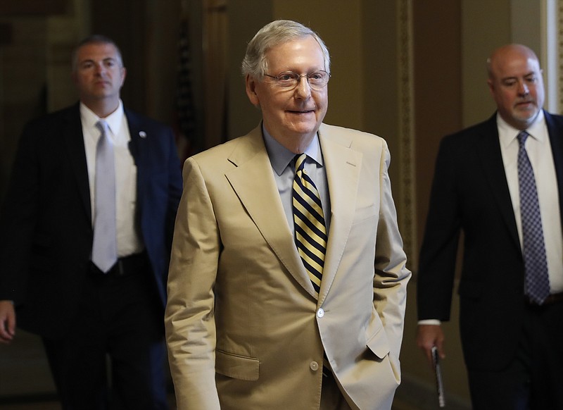 
              Senate Majority Leader Mitch McConnell of Ky. walks from his office on Capitol Hill in Washington, Monday, June 26, 2017. Senate Republicans unveil a revised health care bill in hopes of securing support from wavering GOP lawmakers, including one who calls the drive to whip his party's bill through the Senate this week "a little offensive." (AP Photo/Carolyn Kaster)
            