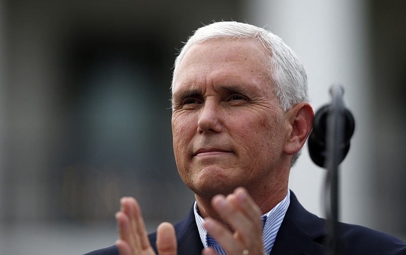 
              FILE- In this June 22, 2017, file photo, Vice President Mike Pence applauds during the Congressional Picnic on the South Lawn of the White House in Washington. Pence is scheduled to visit suburban Cleveland on Wednesday, June 28, to meet with small business owners. (AP Photo/Alex Brandon, File)
            
