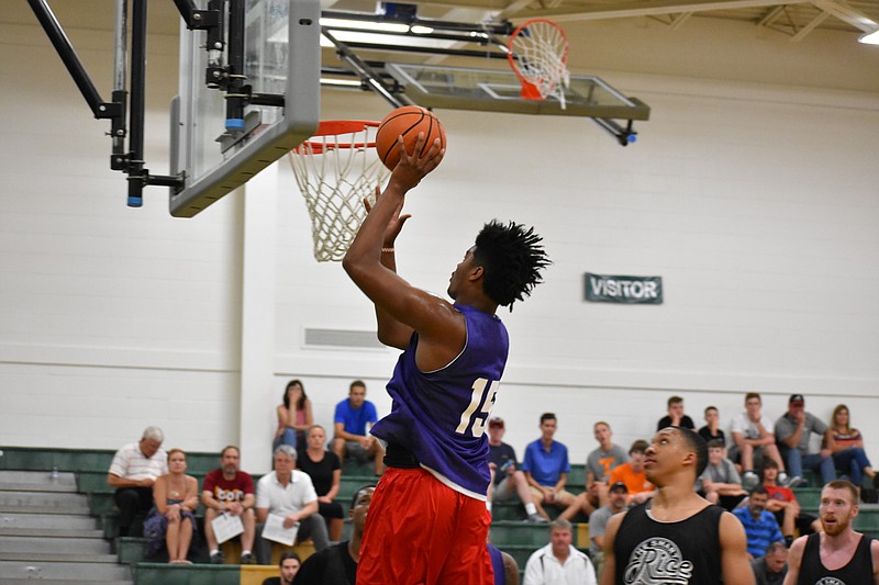 Tennessee freshman forward Derrick Walker competes in the Rocky Top League on Monday, June 26, at Knoxville Catholic High School.