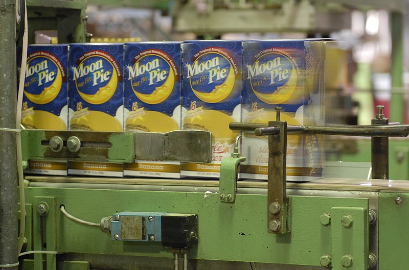 Friday, August 10, 2012
Boxes of MoonPies travel down a conveyor belt at the MoonPie factory on Friday, August 10, 2012. MoonPie has unveiled a new package design for their products, the biggest change to its packaging in nearly two decades.