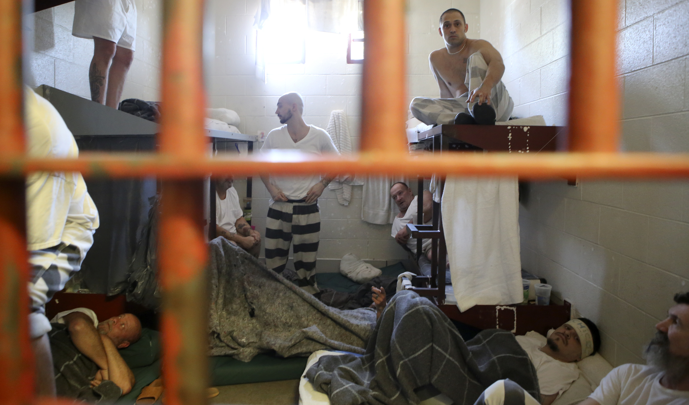 Eleven men share a four-bed cell at the Rhea County Jail on Wednesday, June 28, in Dayton, Tenn. Over 200 inmates are housed at the jail which is only approved to house 87.