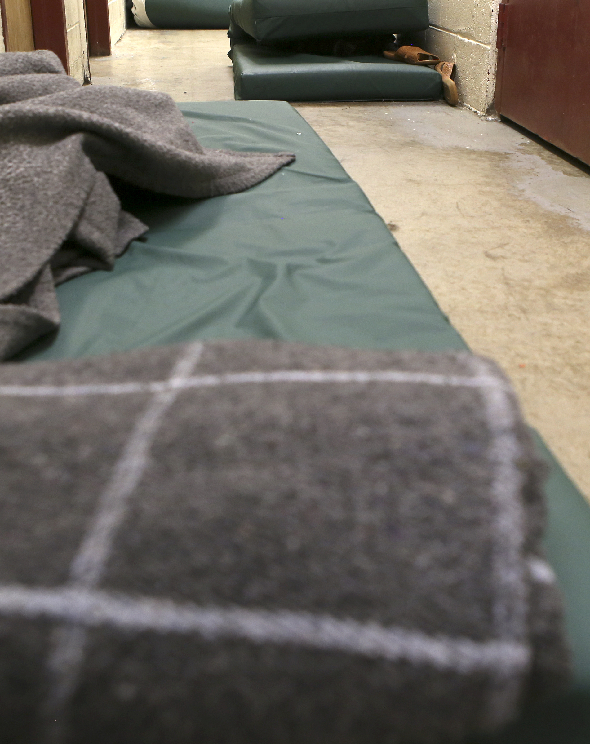 Beds are seen in the hallway of the trusties hall at the Rhea County Jail on Wednesday, June 28, in Dayton, Tenn. Due to overcrowding, some inmates sleep in the hall.