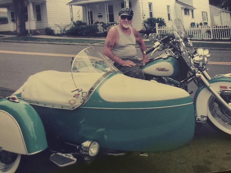 
              In this 2010 photo provided by the family of Arthur Werner Sr., Werner poses for a photo on his 1990 Harley-Davidson Heritage Softail motorcycle in Bethlehem, Pa. Werner, of Steel City, Pa., died of cancer Sunday, June 25, 2017, but made plans to be buried in his motorcycle's sidecar after his funeral scheduled Friday, June 30, 2017. (Brittany Werner via AP)
            