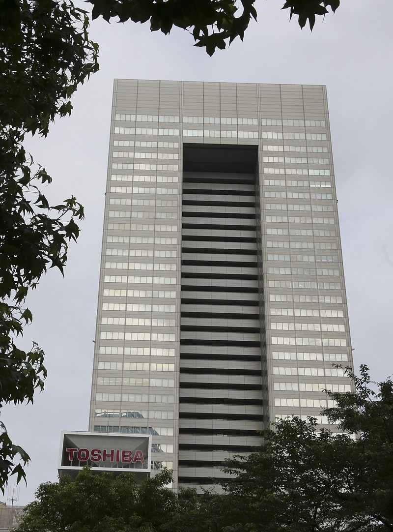 
              This May 26, 2017 photo shows Japanese electronics and energy giant Toshiba Corp. headquarters in Tokyo. Toshiba has delayed its deadline for reaching an agreement on selling its lucrative computer memory chip business. The company said Wednesday, June 28, negotiations were continuing on a 2 trillion yen ($18 billion) deal with a consortium led by a Japanese government-backed fund. Tokyo-based Toshiba had hoped to have an agreement in time for Wednesday's shareholders meeting, being held in a city east of Tokyo. (AP Photo/Koji Sasahara)
            