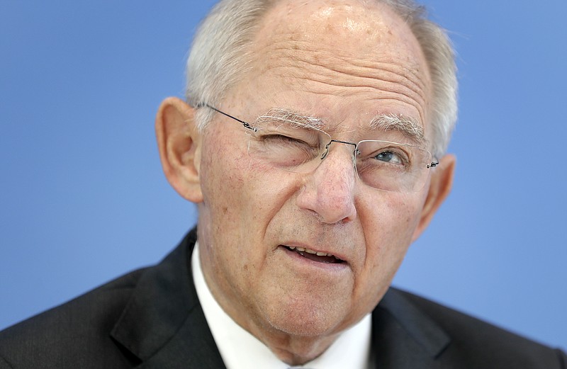 
              German Finance Minister Wolfgang Schaeuble addresses the media during a press conference on the financial outlook 2018 in Berlin, Germany, Wednesday, June 28, 2017. (AP Photo/Michael Sohn)
            