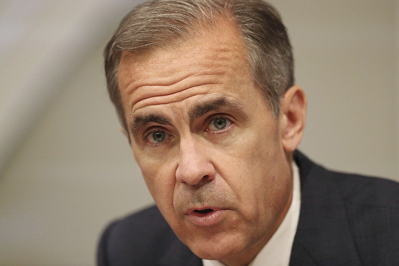 
              Bank of England Governor Mark Carney speaks during the Bank of England's financial stability report at the Bank of England in the City of London on Tuesday June 27, 2017.  (Jonathan Brady/Pool via AP)
            