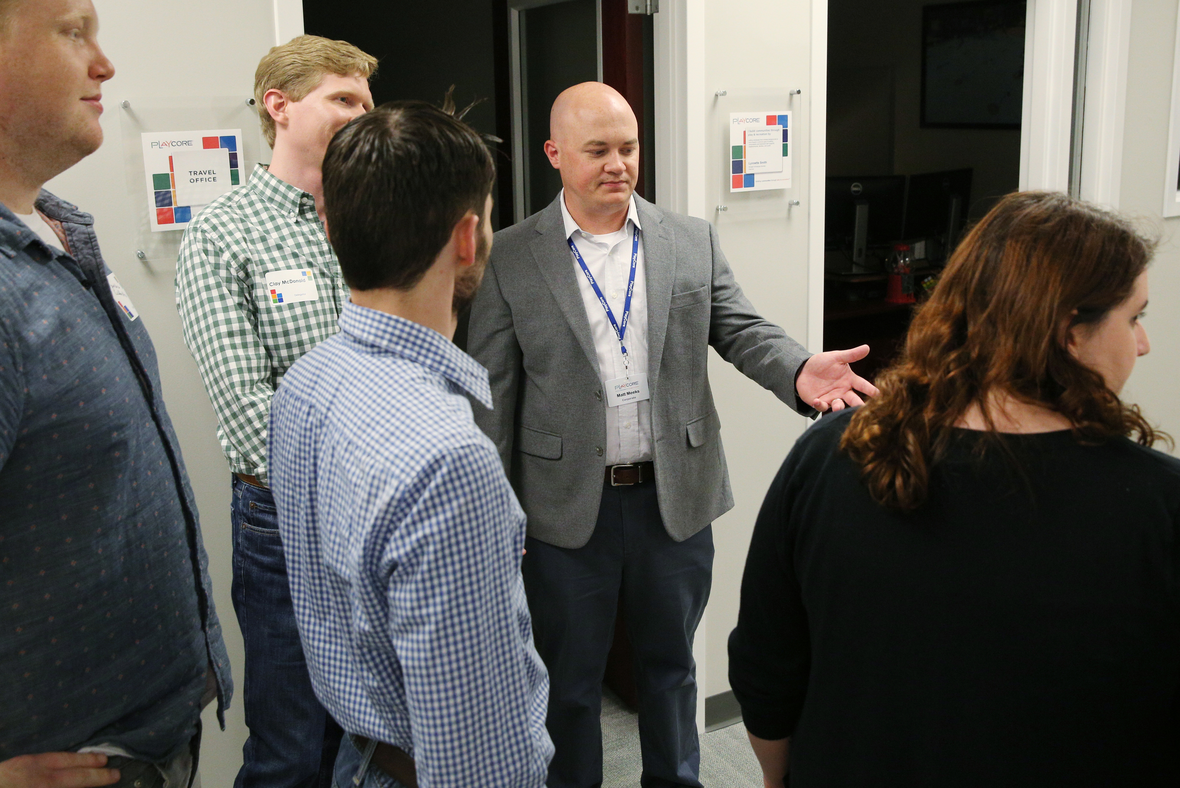 Matt Meeks gives a group of people a tour Thursday, June 29, 2017, during PlayCore's grand opening event in Chattanooga, Tenn. The company originally had seven employees in its corporate office when it was founded 19 years ago and now has more than 100.