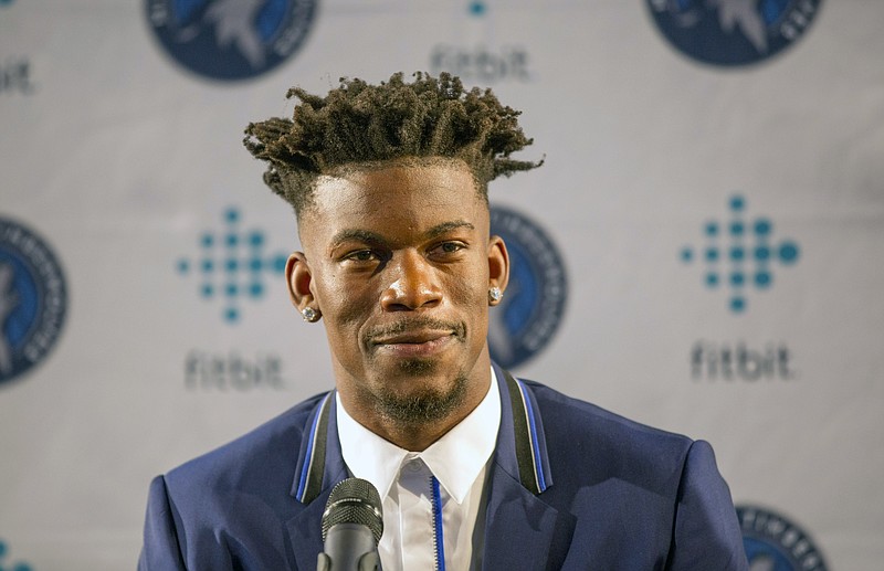 
              Minnesota Timberwolves new point guard Jimmy Butler smiles during a press conference at Mall of America in Bloomington, Minn., on Thursday, June 29, 2017.(AP Photo/Andy Clayton-King)
            