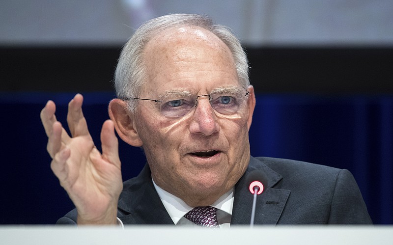 
              German Finance Minister Wolfgang Schaeuble speaks during the Economy Day of the Economic Council of the German Christian Democratic Party  in Berlin, Germany, Tuesday, June 27, 2017.  Around 3,500 representatives from politics, economy and science participate in the event. (Bernd von Jutrczenka/dpa via AP)
            