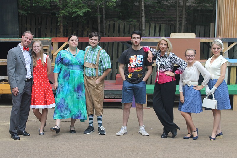 Four of the children who find golden tickets granting admission to Willy Wonka's chocolate factory in "Roald Dahl's Willy Wonka" pose with their parents. From left are Steve and Maggie Meller as Mr. Salt and Veruca Salt, Deborah Meeks as Mrs. Gloop and Grayson Davis as Augustus Gloop, Noah Huseman as Mike Teavee and Beth McClary as Ms. Teavee, and Molly And Shandra Burnett as Violet Beauregarde and Mrs. Beauregarde. (Contributed photo)