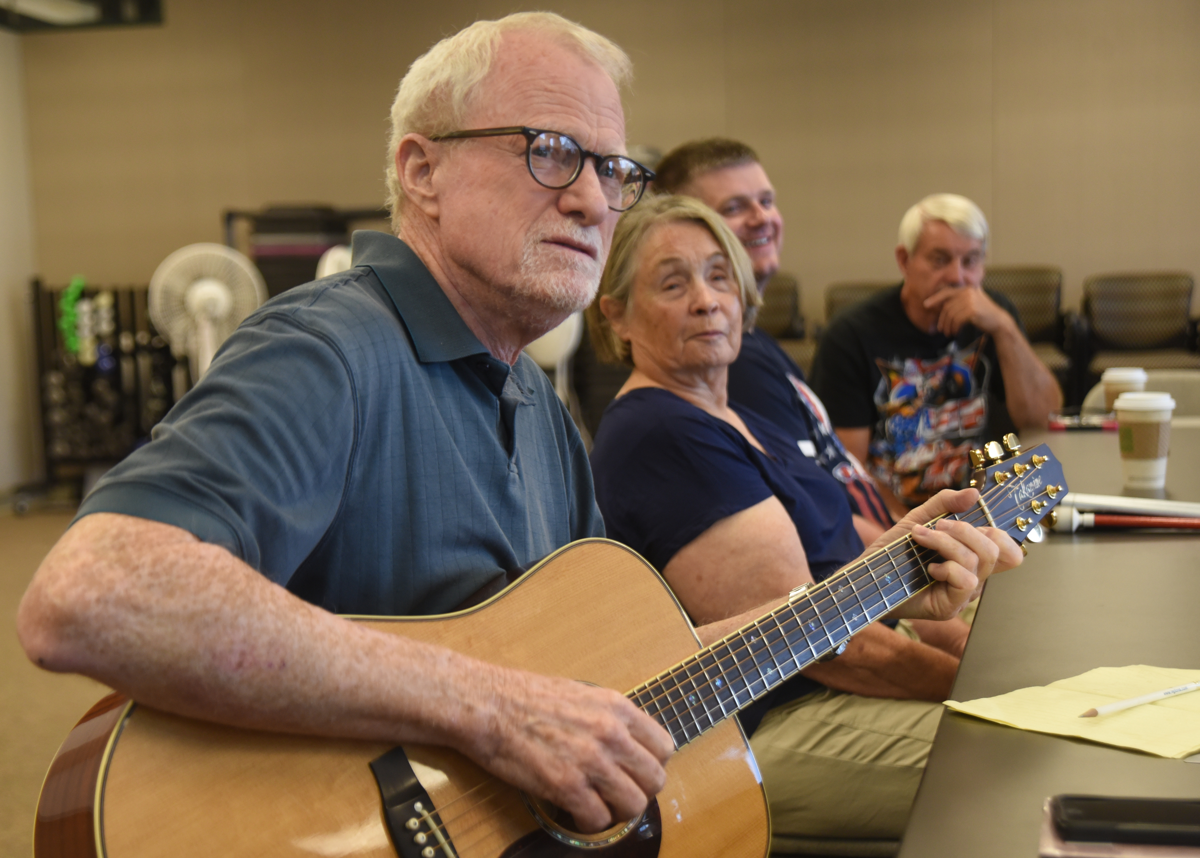 Bob Regan plays a song during an Operation Song meeting at the Chattanooga Lifestyle Center July 6, 2016.