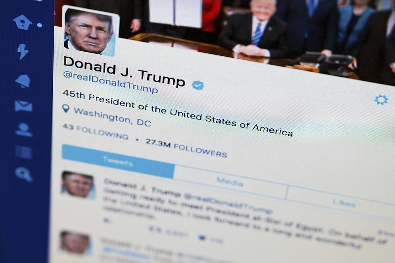 President Donald Trump's tweeter feed is photographed on a computer screen in Washington. (AP Photo/J. David Ake)