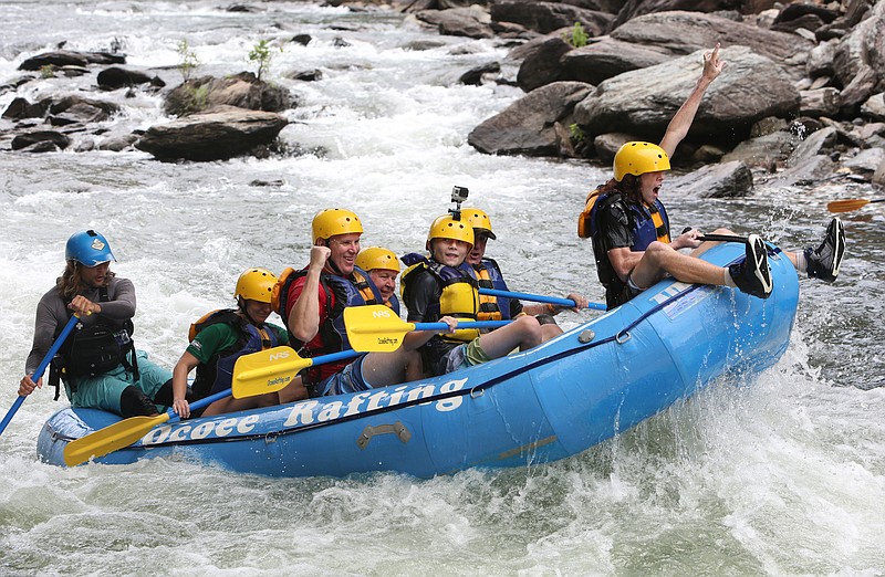 A group rafts with Ocoee Rafting Friday, June 30, 2017, on the Ocoee River in Polk County, Tenn. The Tennessee Valley Authority recently came to an agreement with rafting outfitters that will keep their business afloat. 