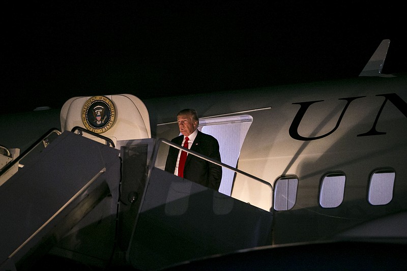 President Donald Trump exits Air Force One at Morristown Municipal Airport in Morristown, N.J., last Saturday.
