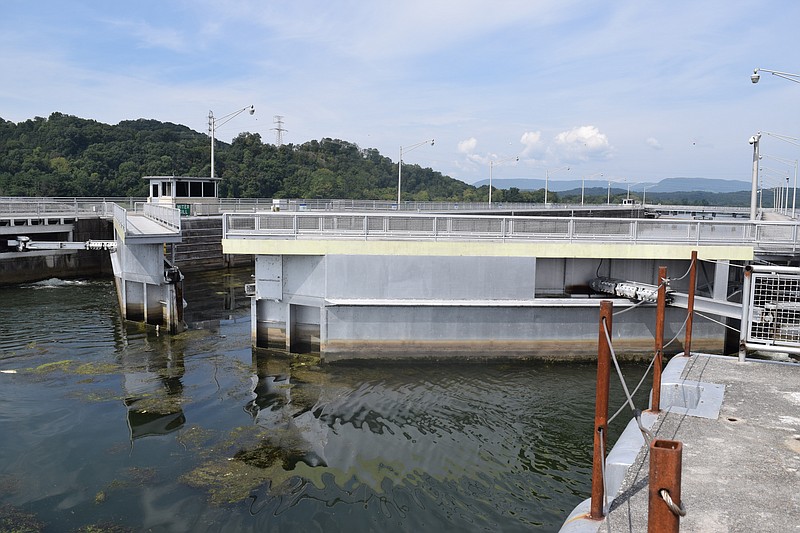 The upstream gates open on the lock Wednesday, Sept. 2, 2015, at Nickajack Dam to allow passage of a pleasure boat from Lake Nickajack to Lake Guntersville. The lock is the target of updates to reopen it to the public for the first time since Sept. 11, 2001.