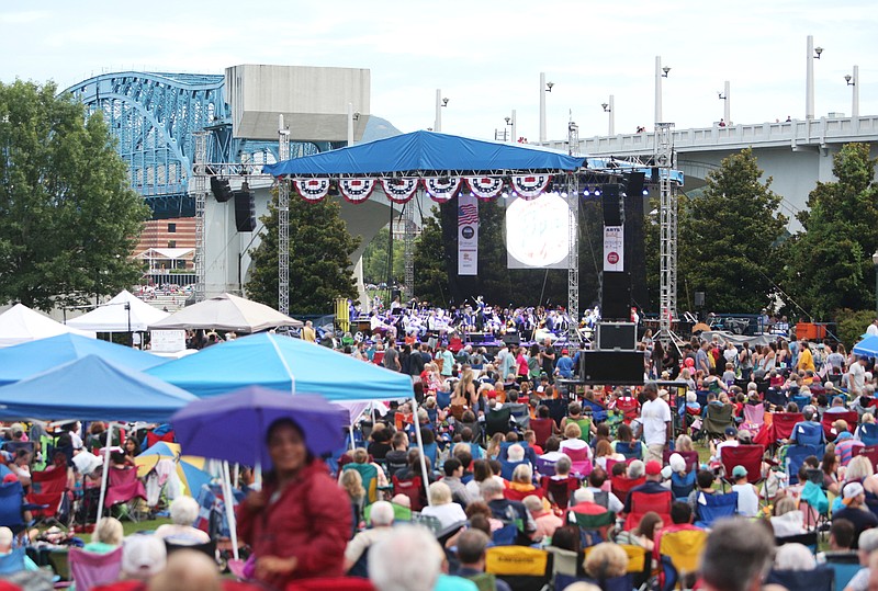 Hundreds fill Coolidge Park in Chattanooga on Monday, July 3, 2017, to see the fireworks and listen to music during Pops on the River. The Chattanooga Symphony & Opera performed during the event.