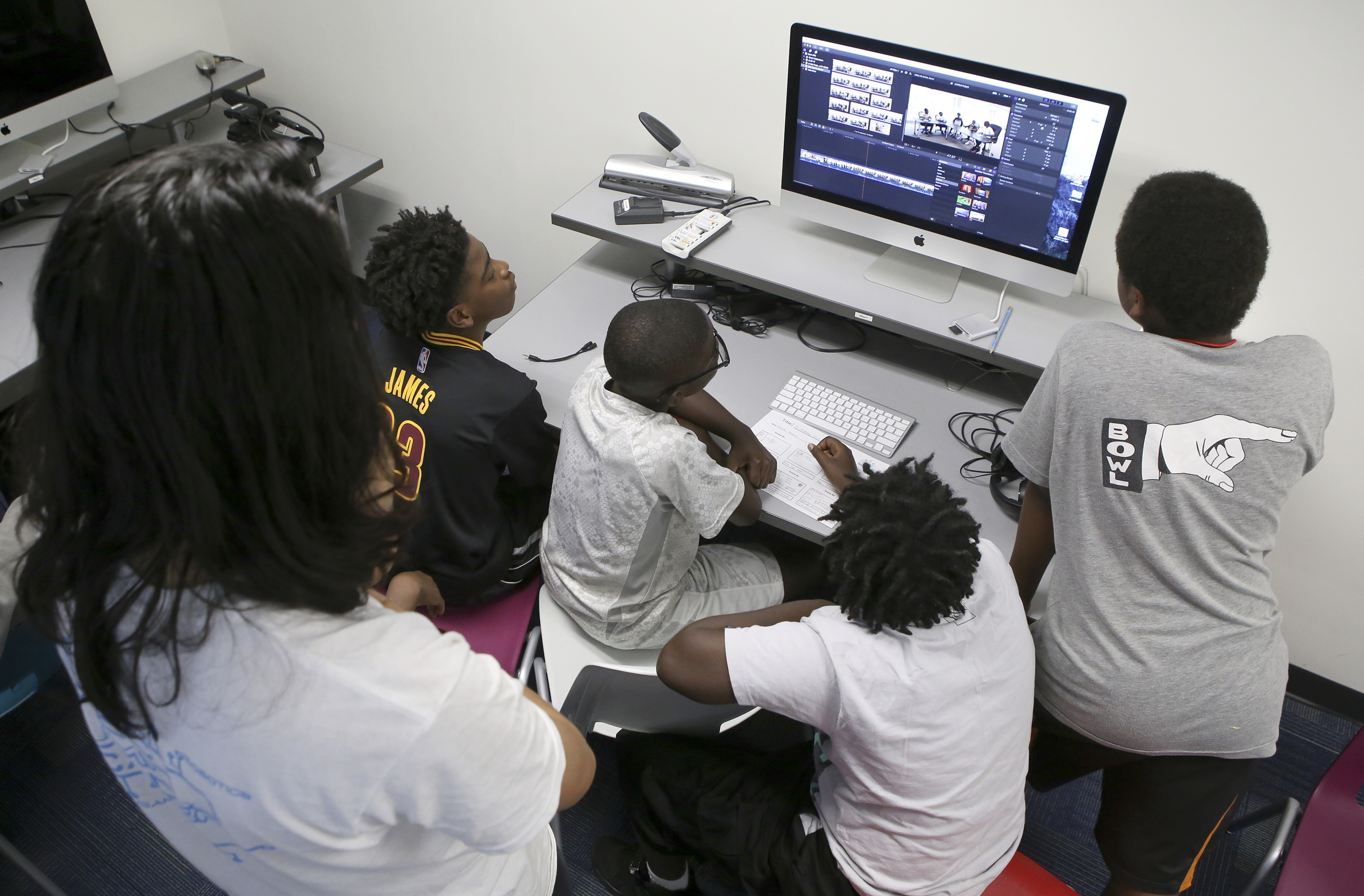 A group of campers work on editing in Final Cut Pro during Tech Town camp at the Edeny Building on Thursday, June 29, in Chattanooga, Tenn.