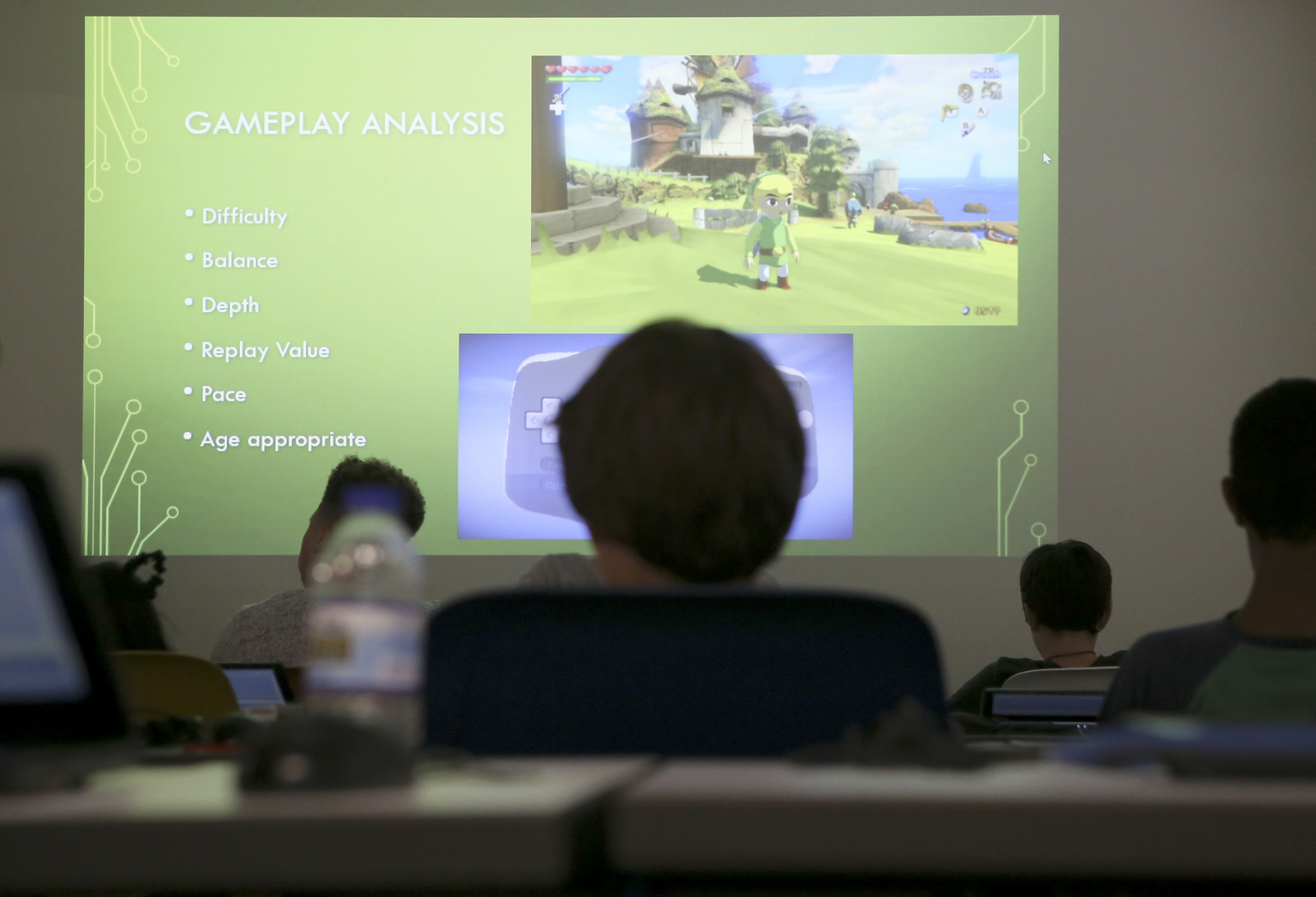 A group of campers sit in on a video game design coding during Tech Town camp at the Edeny Building on Thursday, June 29, in Chattanooga, Tenn.
