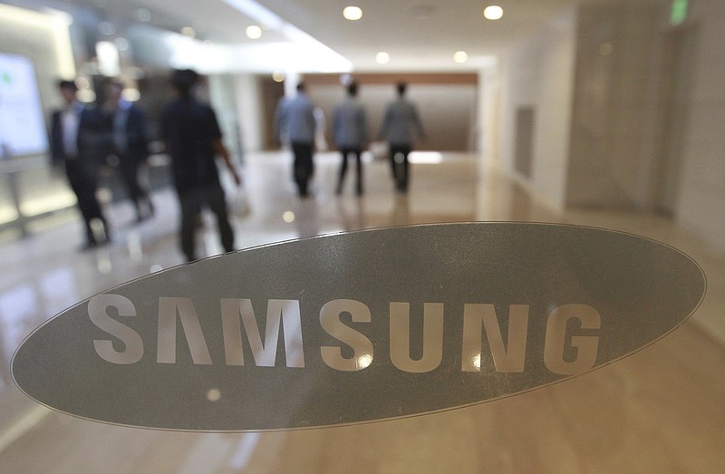 
              FILE - In this Oct. 12, 2016, file photo, the corporate logo of Samsung Electronics Co. is seen at its shop in Seoul, South Korea.  Samsung Electronics said Friday, July 7, 2017,  its second-quarter operating profit soared 72 percent over a year earlier to the highest in its history as its semiconductor sales helped defy sluggish growth in the smartphone market and a slow recovery in the global economy.  (AP Photo/Ahn Young-joon, File)
            
