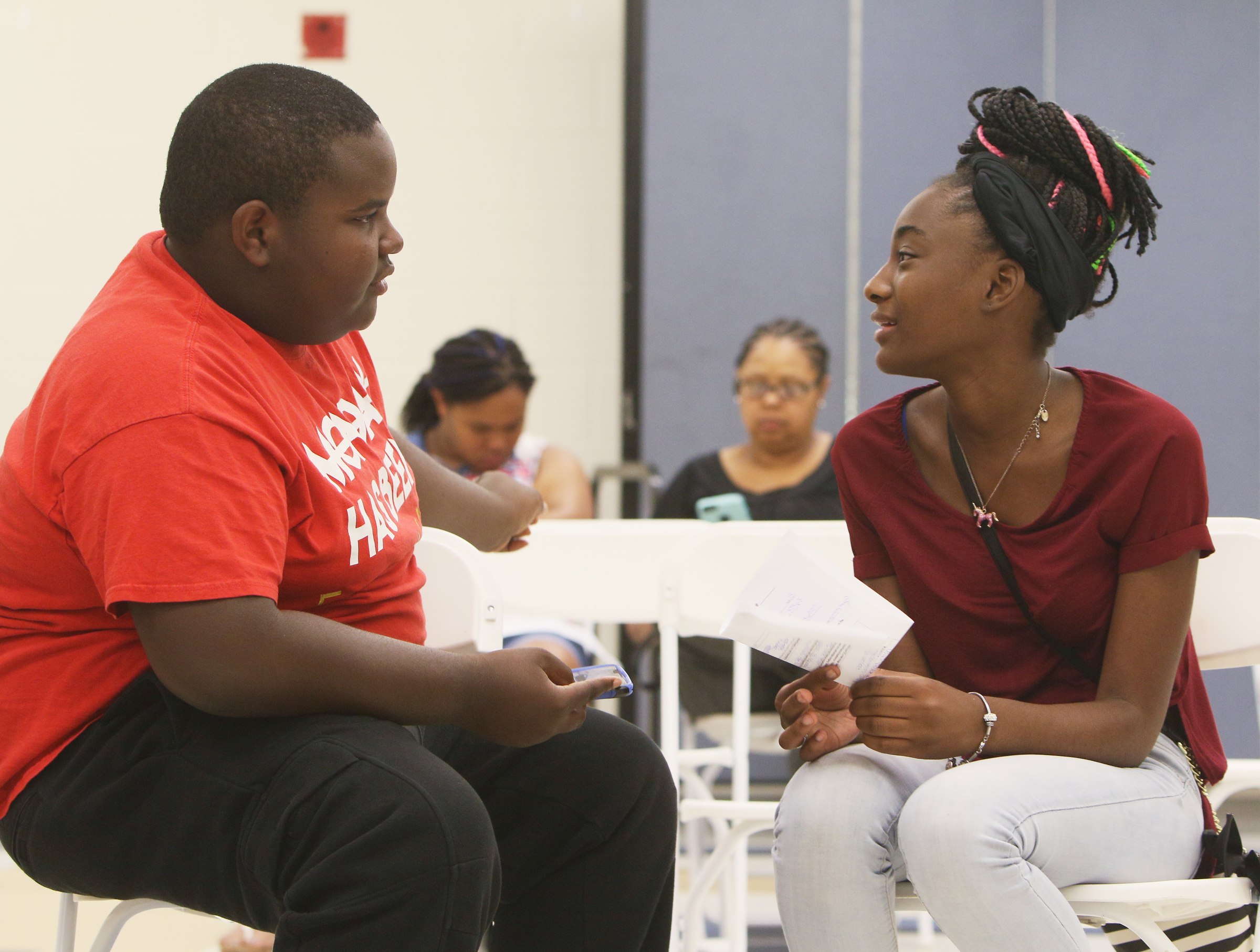 Darrius Calloway, 13, and Kaylyn Yancey, 13, talk as they wait for their audition times for The Wiz Monday, June 26, 2017, at the South Chattanooga Recreation Center in Chattanooga, Tenn. Those who auditioned Monday will be receiving call-backs later this week to find out if they made it to the next round of their auditions.