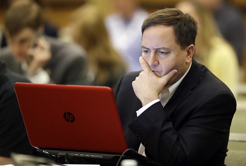 Missouri Secretary of State Jay Ashcroft looks at notes during a voter registration meeting at the the National Association of Secretaries of State conference, Saturday, July 8, 2017, in Indianapolis. (AP Photo/Darron Cummings)