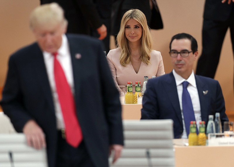 
              Ivanka Trump, daughter of U.S. President Donald Trump, left, attends a working session at the G-20 summit in Hamburg, northern Germany, Saturday, July 8, 2017. The leaders of the group of 20 meet July 7 and 8. (AP Photo/Michael Sohn)
            