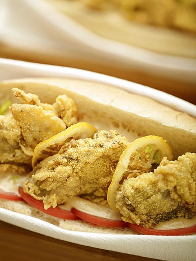 This July 6, 2017 photo provided by The Culinary Institute of America shows oyster Po' boy sandwiches in Hyde Park, N.Y. This dish is from a recipe by the CIA. (Phil Mansfield/The Culinary Institute of America via AP)
