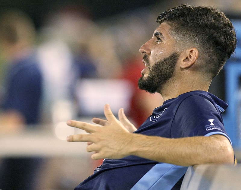 Chattanooga FC forward Felipe Oliveira (20) reacts on the bench after falling to Inter Nashville FC 2-1 in a play-in match for the NPSL Southeast Conference semifinals at Finley Stadium on Tuesday, July 11, in Chattanooga, Tenn.