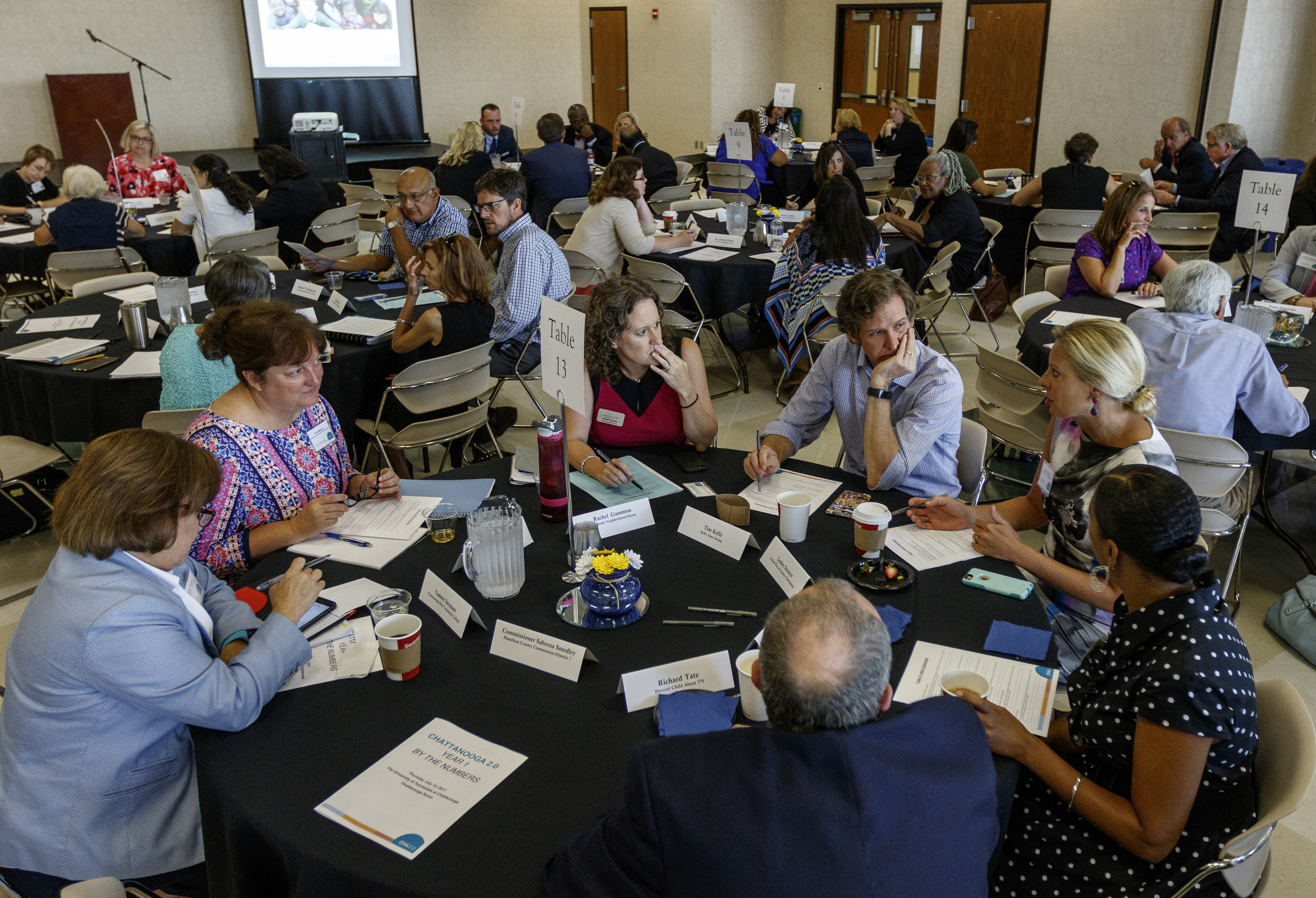 People talk in discussion groups during an update on the Chattanooga 2.0 initiative on the campus of the University of Tennessee at Chattanooga on Thursday, July 13, 2017, in Chattanooga, Tenn. Chattanooga 2.0 launched a year ago with the goal of improving education outcomes in Hamilton County.