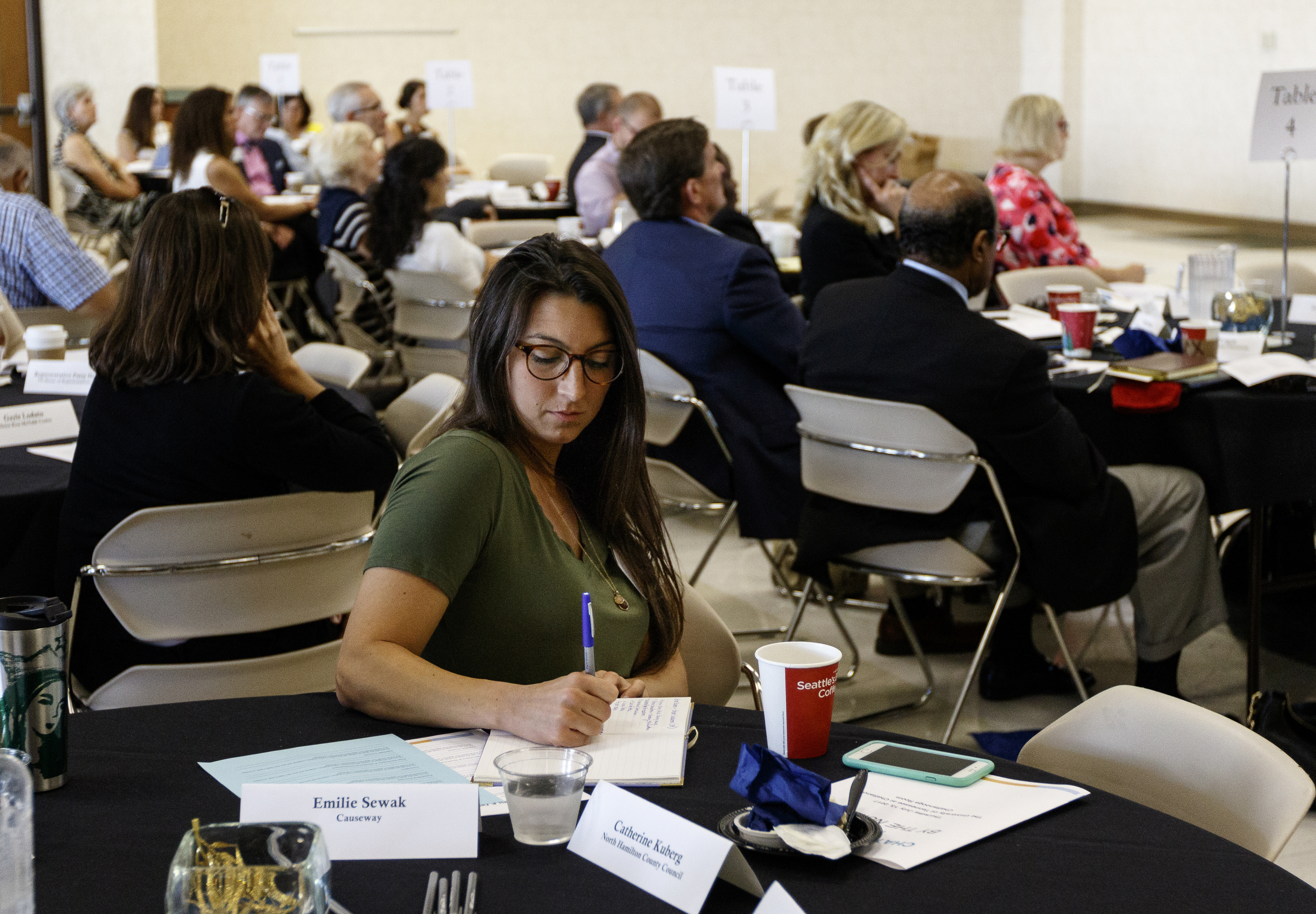 Emilie Sewak with Causeway takes notes during an update on the Chattanooga 2.0 initiative on the campus of the University of Tennessee at Chattanooga on Thursday, July 13, 2017, in Chattanooga, Tenn. Chattanooga 2.0 launched a year ago with the goal of improving education outcomes in Hamilton County.