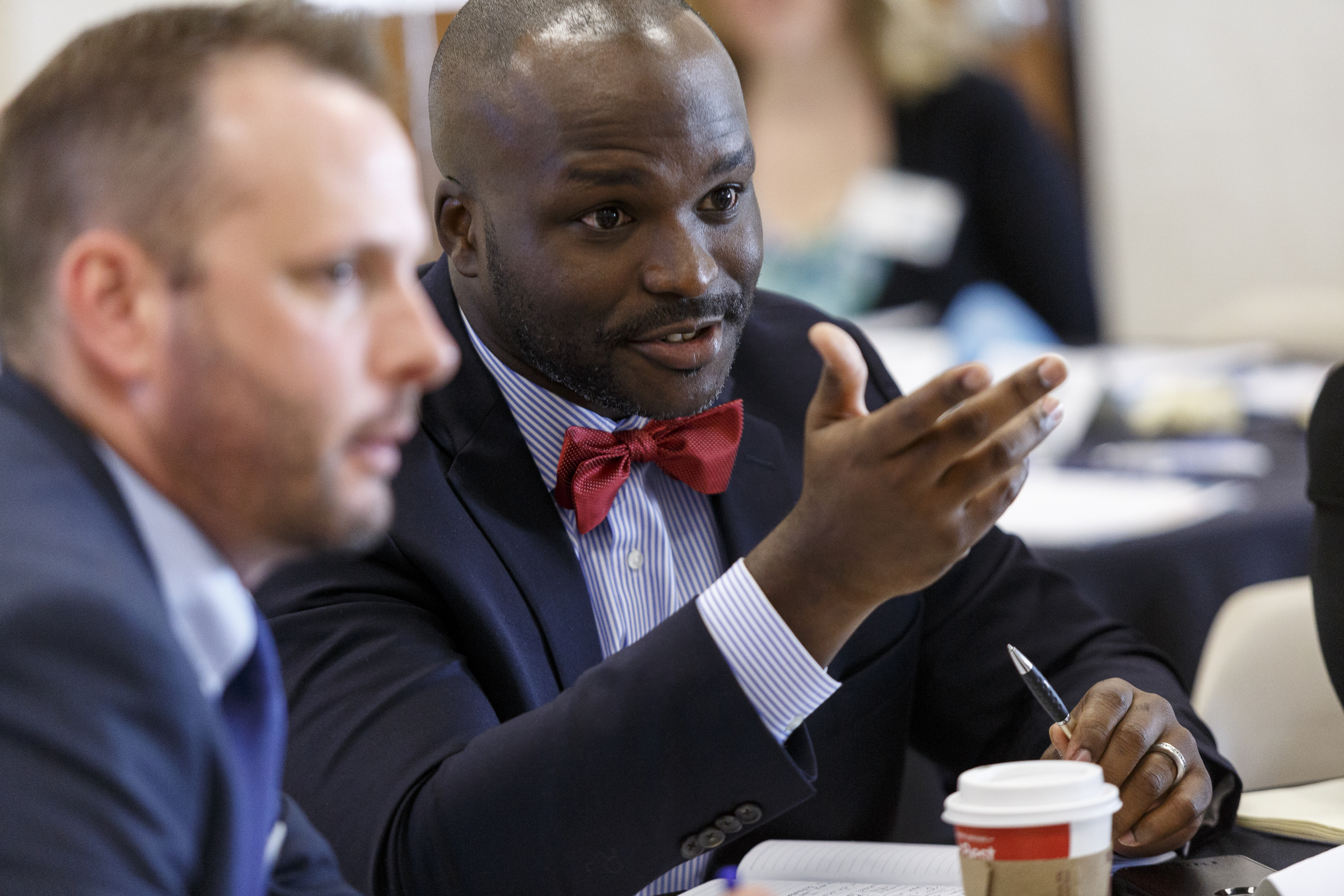 New Hamilton County Schools Superintendent Dr. Bryan Johnson, right, talks with Chattanooga 2.0's Dr. Jared Bigham during an update on the Chattanooga 2.0 initiative on the campus of the University of Tennessee at Chattanooga on Thursday, July 13, 2017, in Chattanooga, Tenn. Chattanooga 2.0 launched a year ago with the goal of improving education outcomes in Hamilton County.