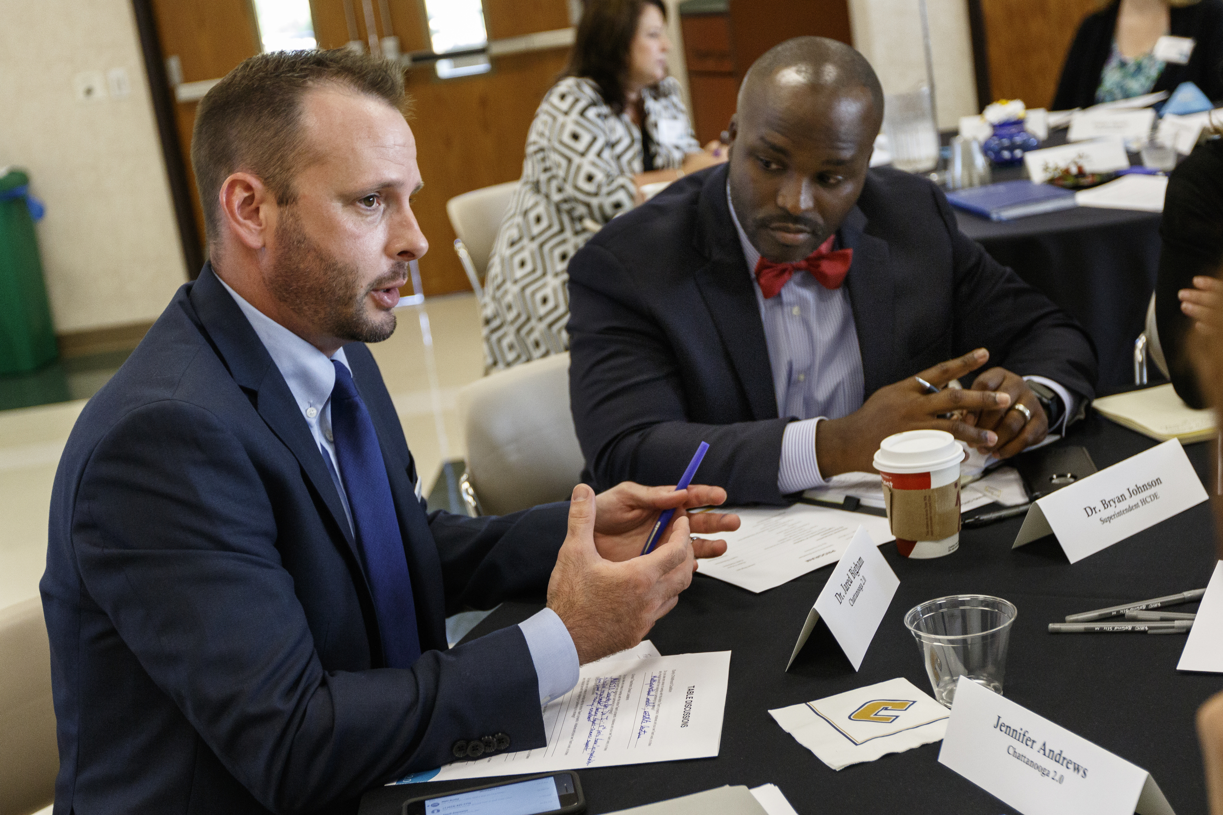 Chattanooga 2.0's Dr. Jared Bigham, left, talks with New Hamilton County Schools Superintendent Dr. Bryan Johnson during an update on the Chattanooga 2.0 initiative on the campus of the University of Tennessee at Chattanooga on Thursday, July 13, 2017, in Chattanooga, Tenn. Chattanooga 2.0 launched a year ago with the goal of improving education outcomes in Hamilton County.
