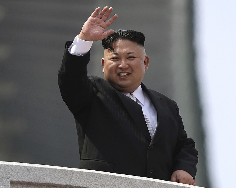 
              FILE - In this Saturday, April 15, 2017, file photo, North Korean leader Kim Jong Un waves during a military parade to celebrate the 105th birth anniversary of Kim Il Sung in Pyongyang, North Korea. When Kim Jong Un took the helm of North Korea in late 2011, speculation swirled around the young leader. What would he do for an economically backward authoritarian nation in a high-stakes nuclear standoff with its neighbors and Washington? Almost six years later, his rule has actually seen the economy improve, and when it comes to the nuclear drive, it's obvious that Kim Jong Un, who rattled nerves last week by test-firing his country's first intercontinental ballistic missile, has a more uncompromising stance than his late father, Kim Jong Il. (AP Photo/Wong Maye-E, File)
            