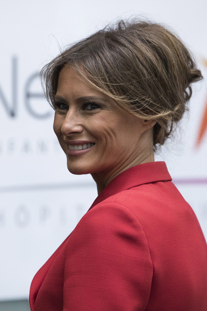 
              First Lady Melania Trump smiles as she visits the Necker hospital, France's biggest pediatric hospital in Paris, Thursday July 13, 2017. Melania Trump is touring the hospital shortly after her arrival in France with President Donald Trump aboard Air Force One. (AP Photo/Kamil Zihnioglu)
            