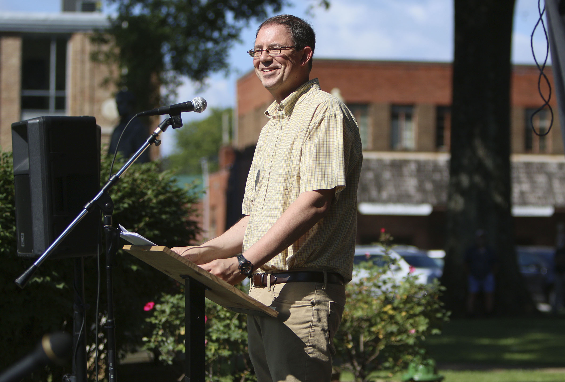 Andrew Kersten, a historian, speaks during the dedication and unveiling event of the Clarence Darrow Commemorative Statue Friday, July 14, 2017, at the Rhea County Courthouse in Dayton, Tenn. William Jennings Bryan was honored by a statue being commissioned by Bryan College and created by Cessna Decosimo in 2005 for the Rhea County Courthouse, and Friday a statue was unveiled for Clarence Darrow.