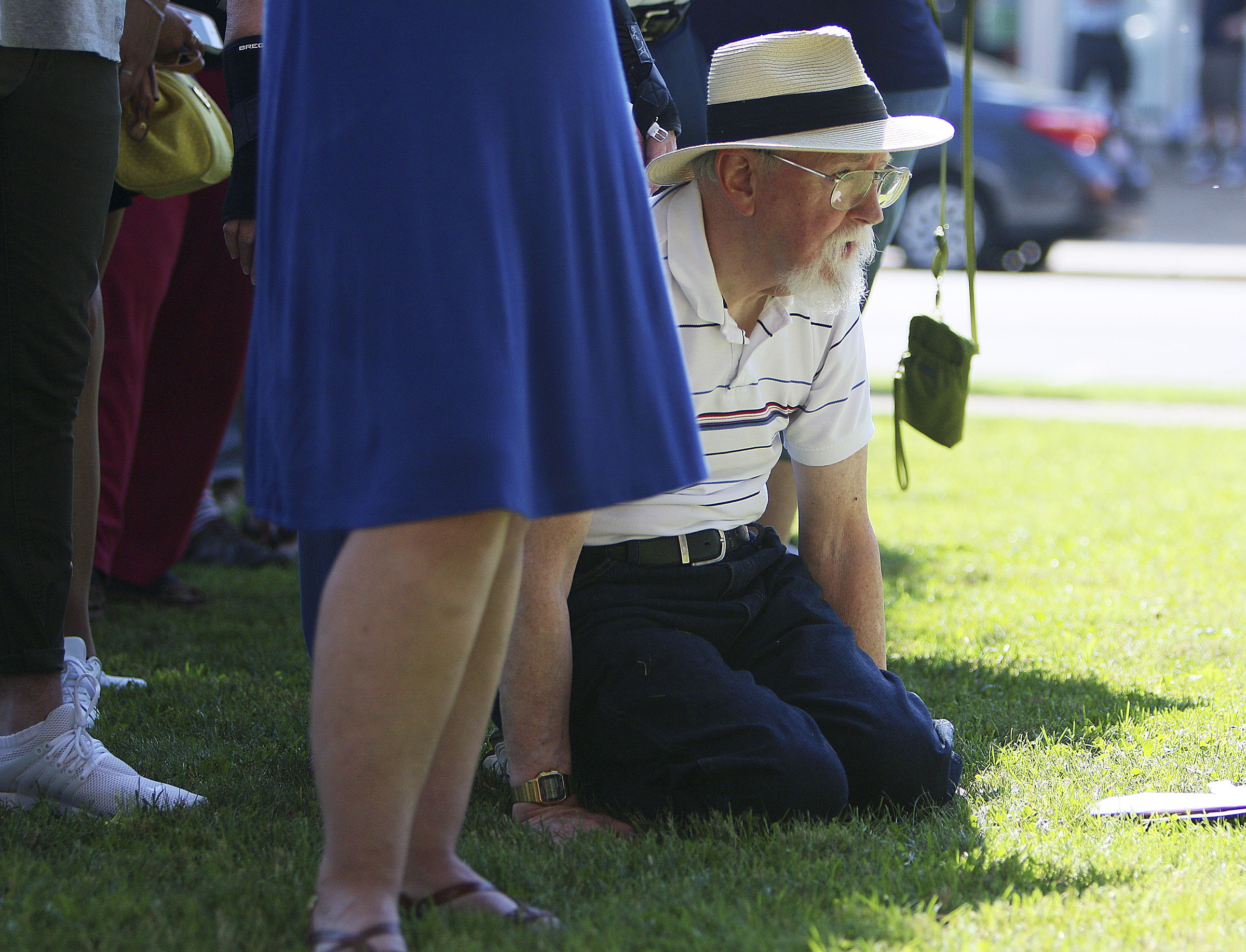 Al Westerfield of Crossville, Tenn., listens to speakers during the dedication and unveiling event of the Clarence Darrow Commemorative Statue Friday, July 14, 2017, at the Rhea County Courthouse in Dayton, Tennessee. Westerfield and his wife were happy to see the sculpture go up.